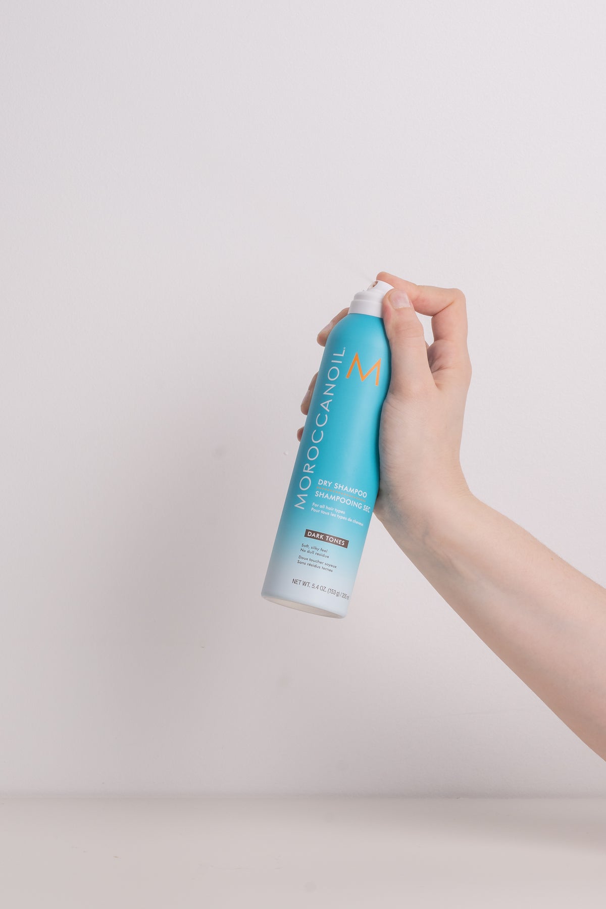 Moroccanoil Dry Shampoo Dark Tones canister shown from the side