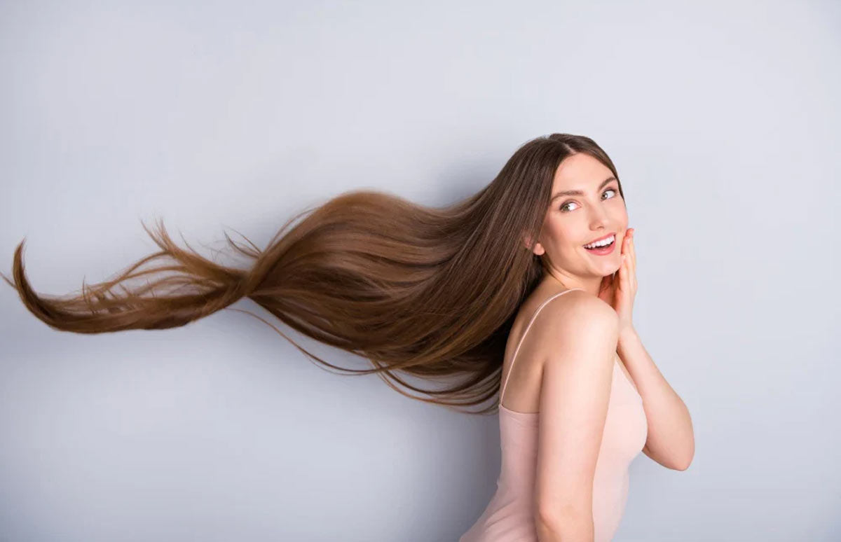 Model demonstrating long, lucid hair extensions