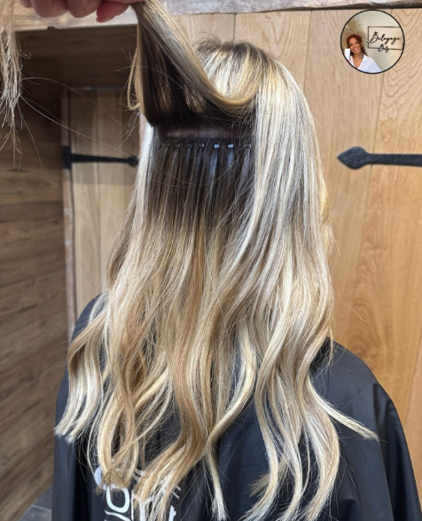 Image of a hand-tied weft in blonde hair.