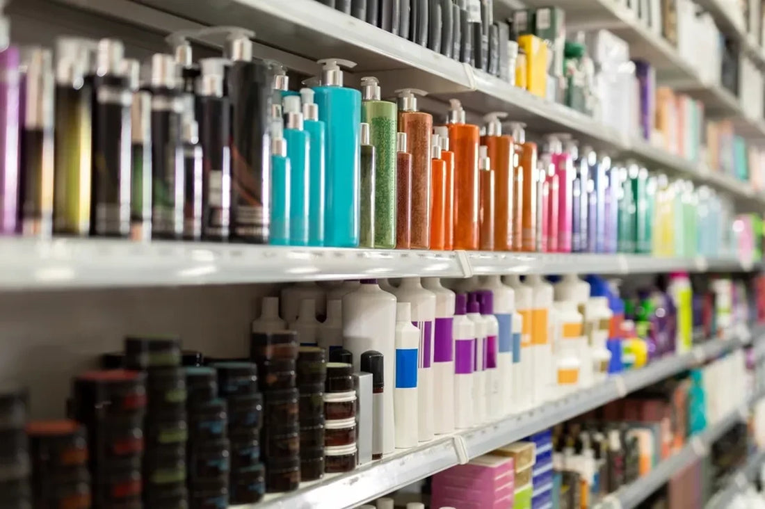 An assortment of colorful hair care products on a store shelf.
