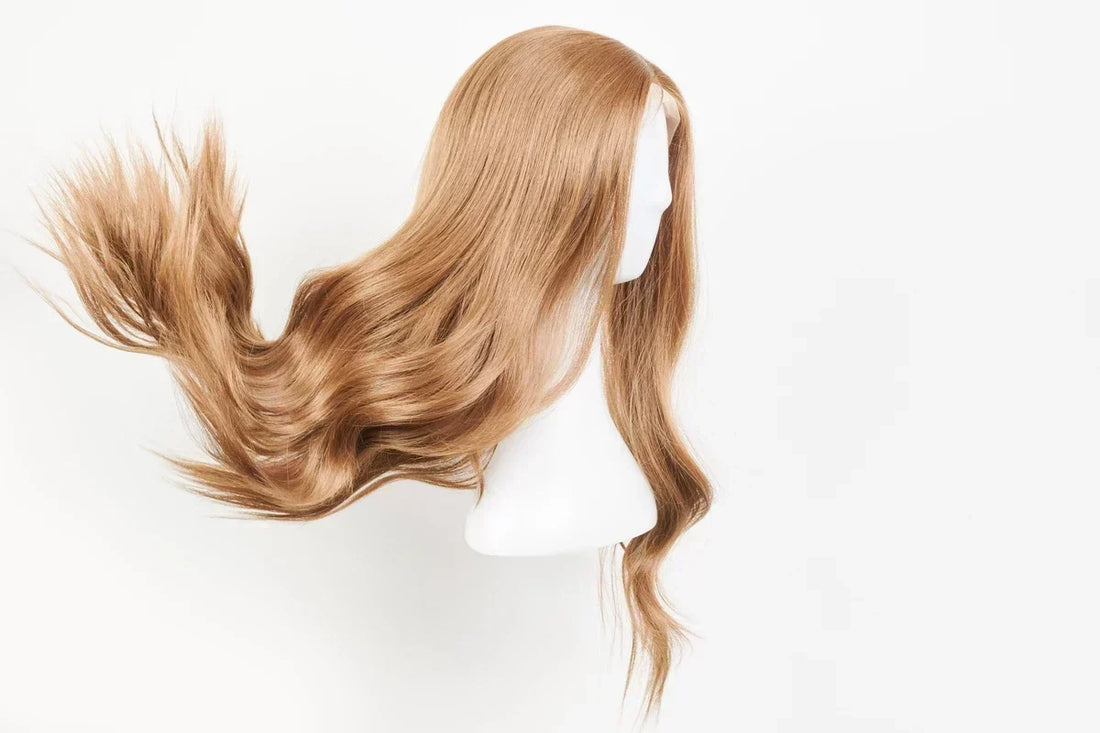 A natural looking dark blonde wig showing lots of natural movement.