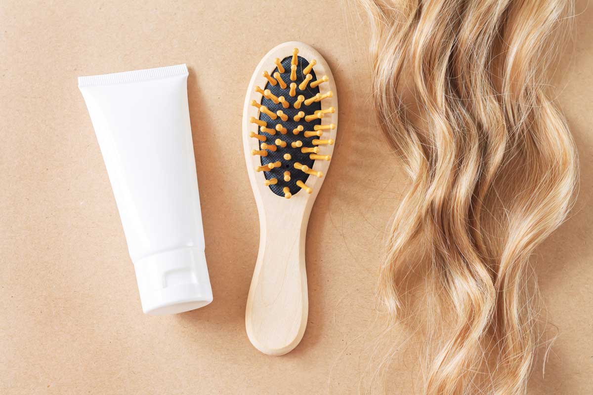Hair topper with brush and shampoo bottle