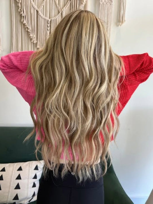 Image of a Lauren Ashtyn wig on a woman from behind. Taken from own site