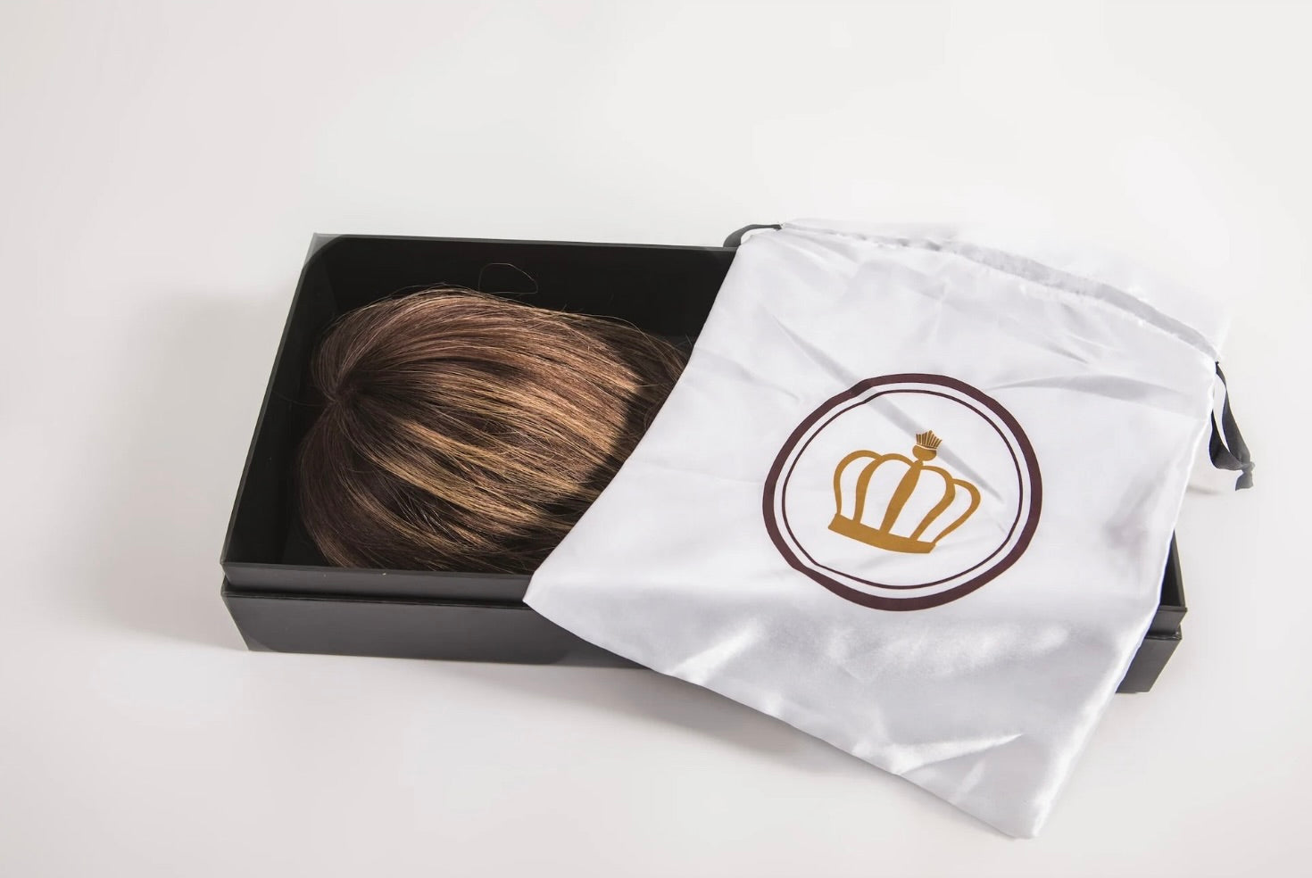 Brunette hair topper for thinning hair packaged in a luxury box.