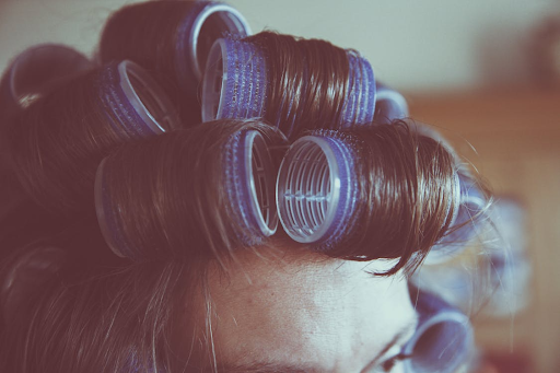 A close-up shot of a woman wearing heatless curls.
