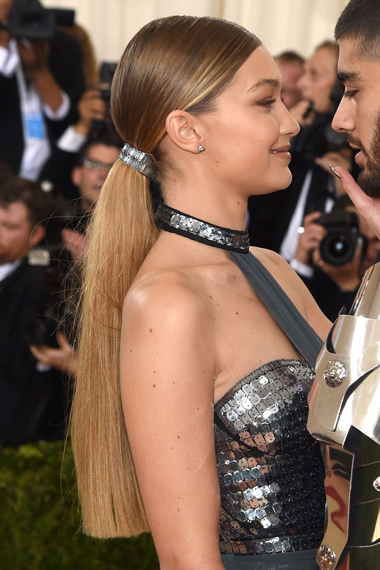 (Image of Gigi Hadid with a metal hair cuff. 