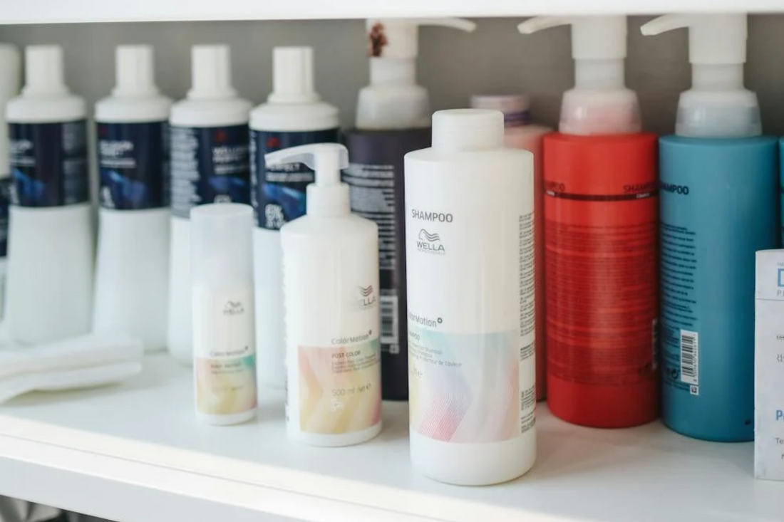 Image of shampoo bottles on shelf. Taken from Pexels