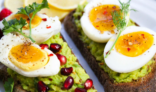 Image of avocado on toast with eggs, seeds, and healthy hair nutrients. Taken from Pexels