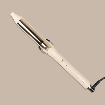 TYME 1.25 inch curling iron for loose bouncy curls and soft waves, in cream and black