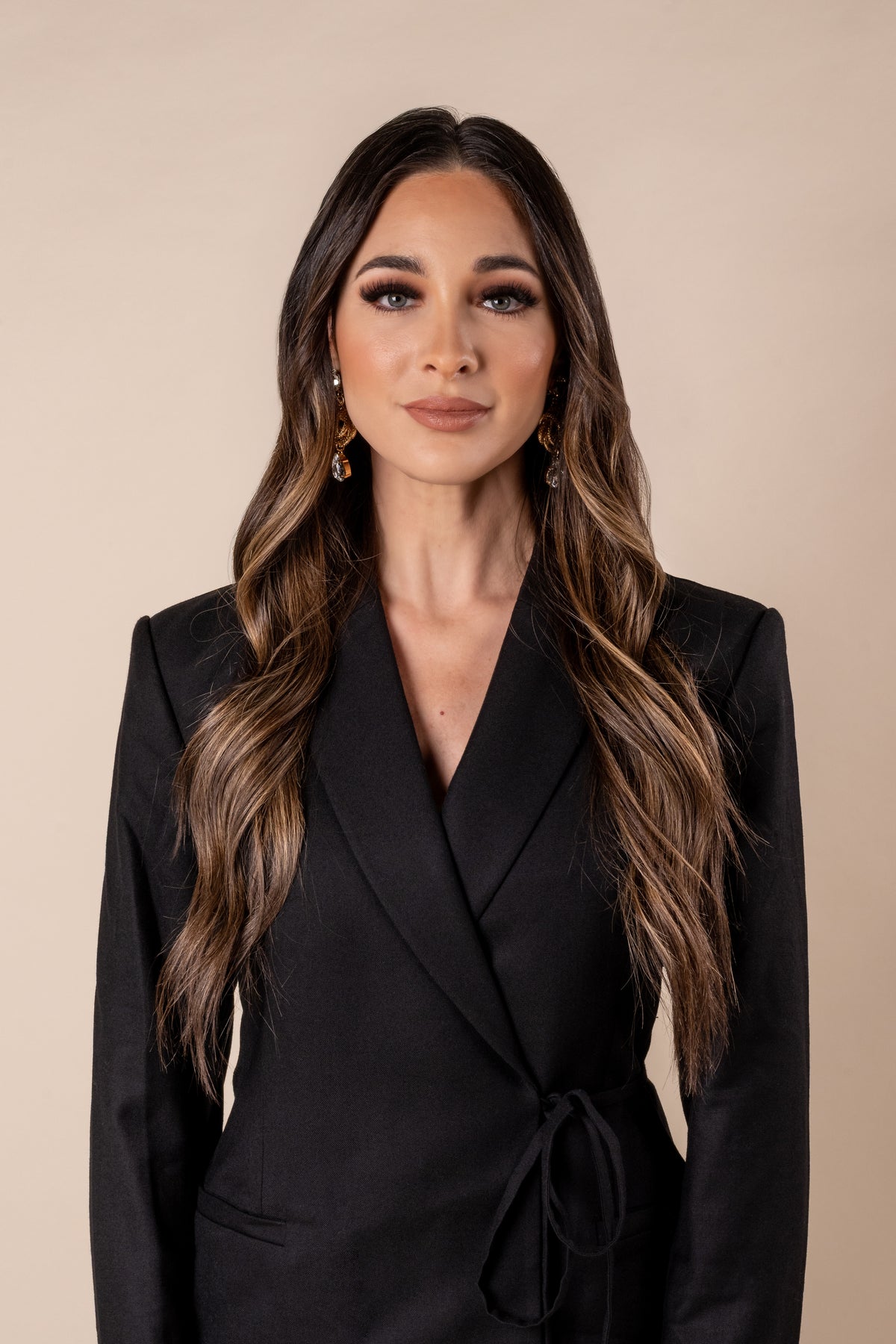 A confident woman with full, natural-looking hair