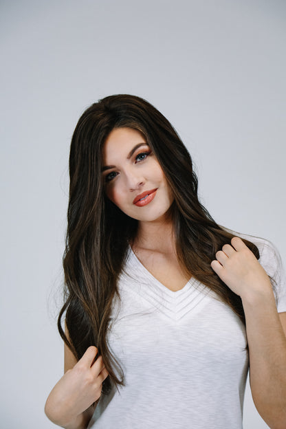 Woman wearing brown hair extensions- front view