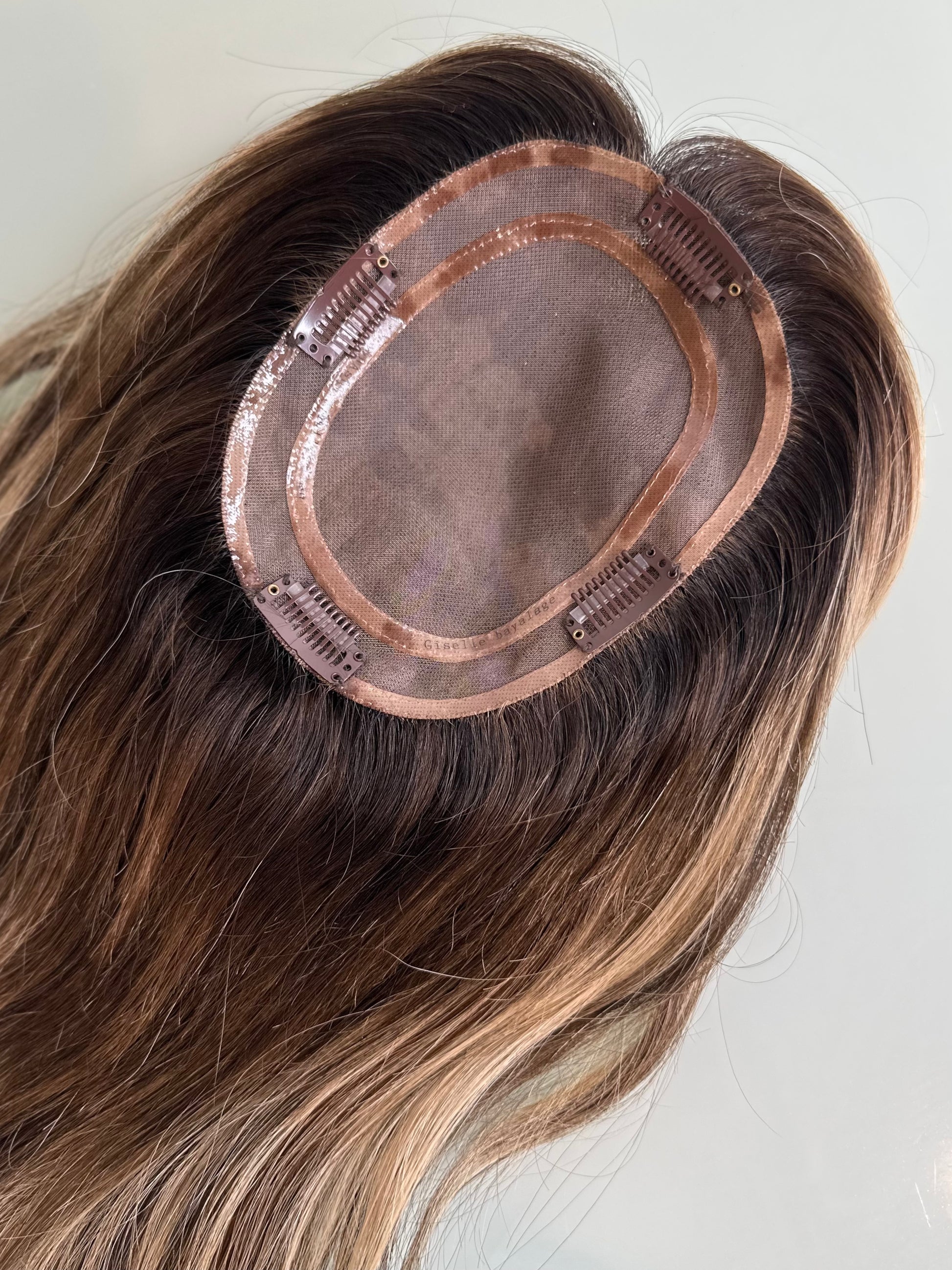 Bottom view of the Lauren Ashtyn Signature Color Full Volume hair topper