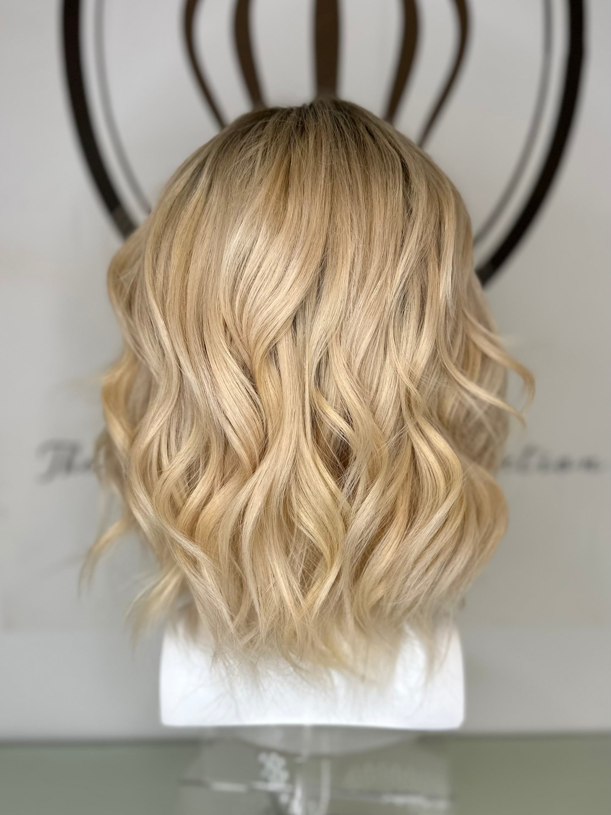 A premium wavy blond hair wig