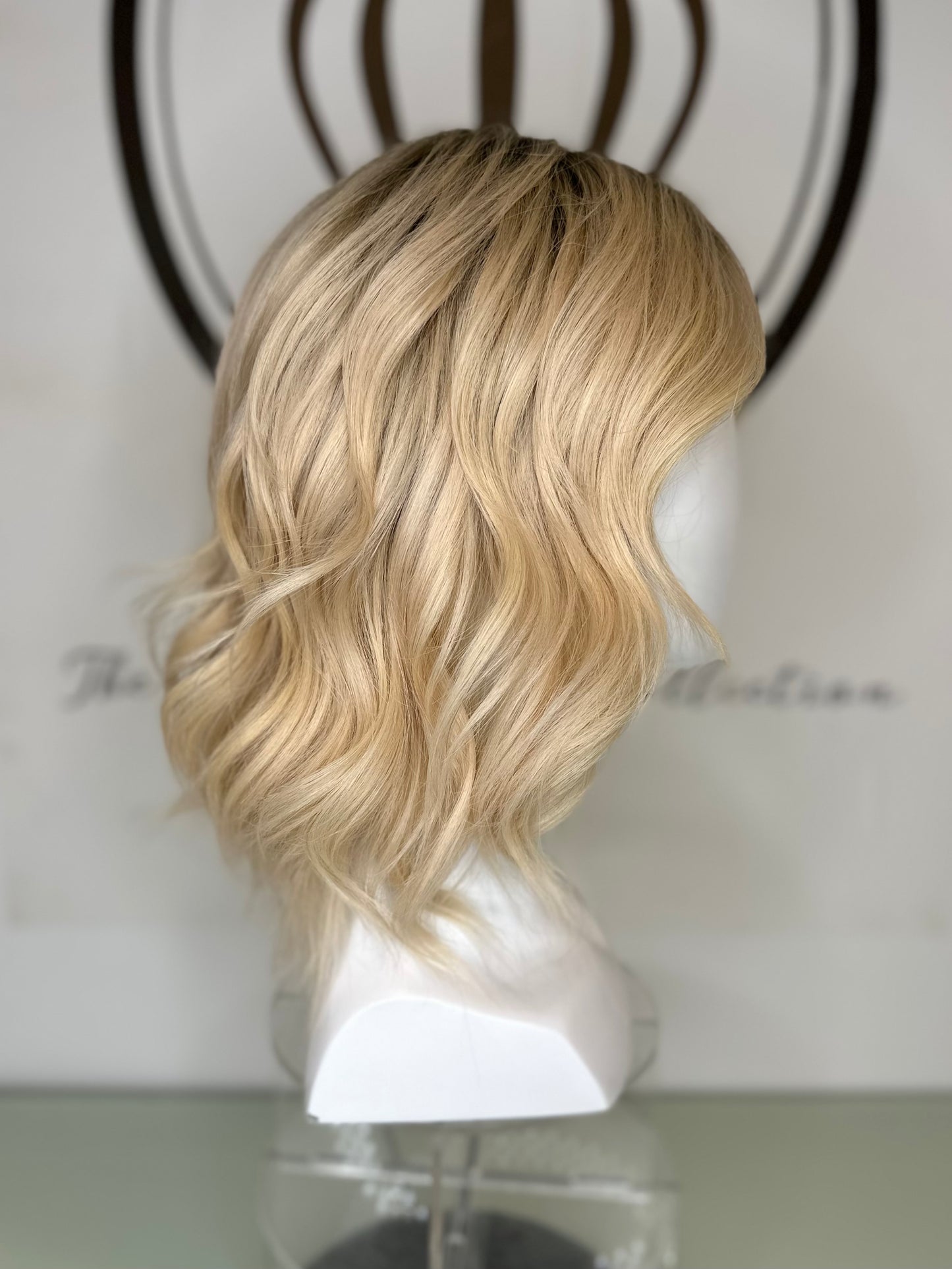 A premium wavy blond hair wig