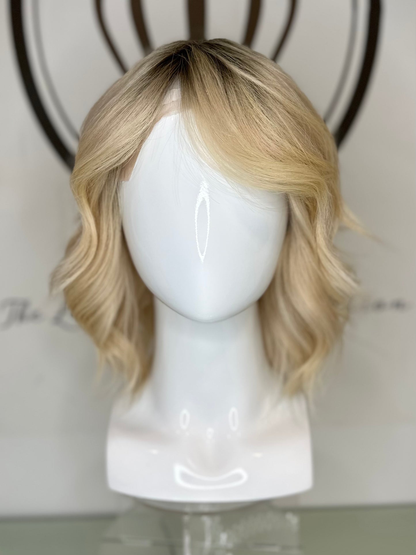 A premium wavy blond hair wig